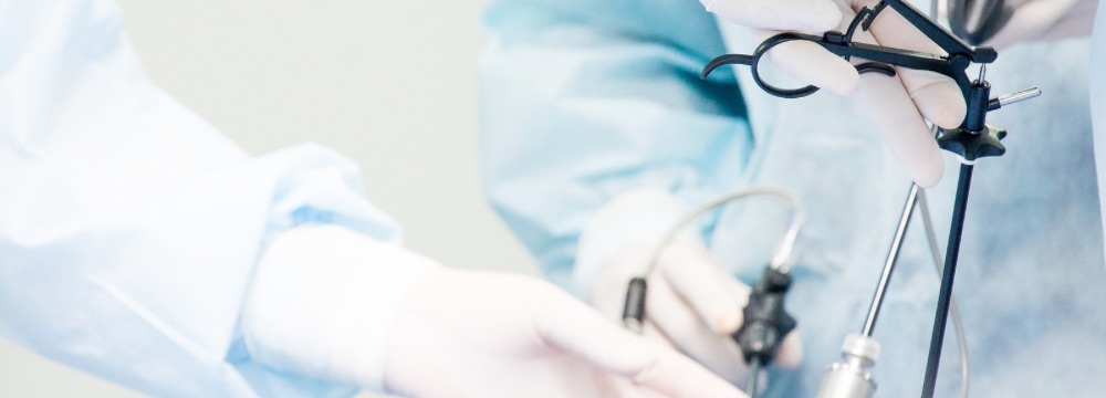 Surgeon glove holding surgical instruments while performing surgery